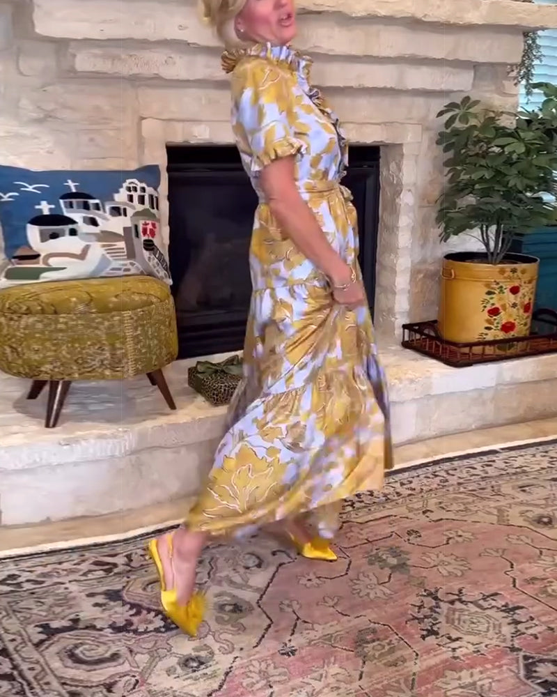 Abito lungo stampato a maniche corte con volant