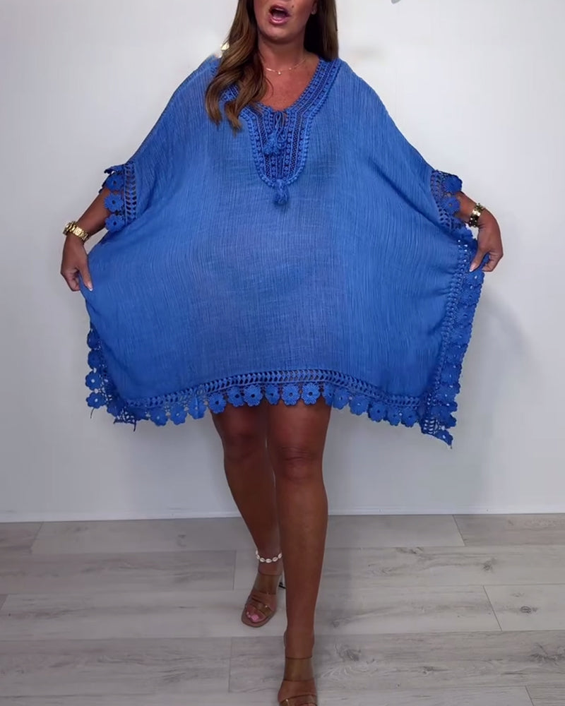 Top con scollo a V e maniche a pipistrello in tinta unita