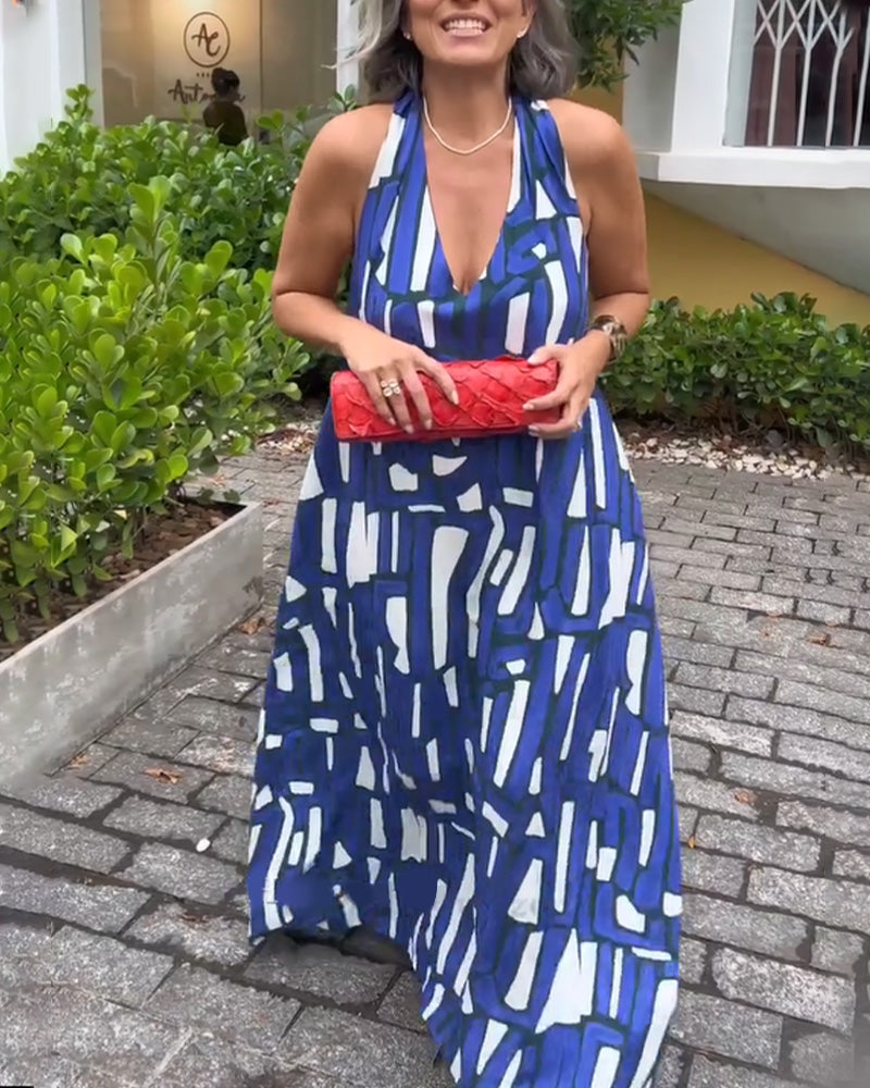 Abito elegante con stampa geometrica e scollo a V