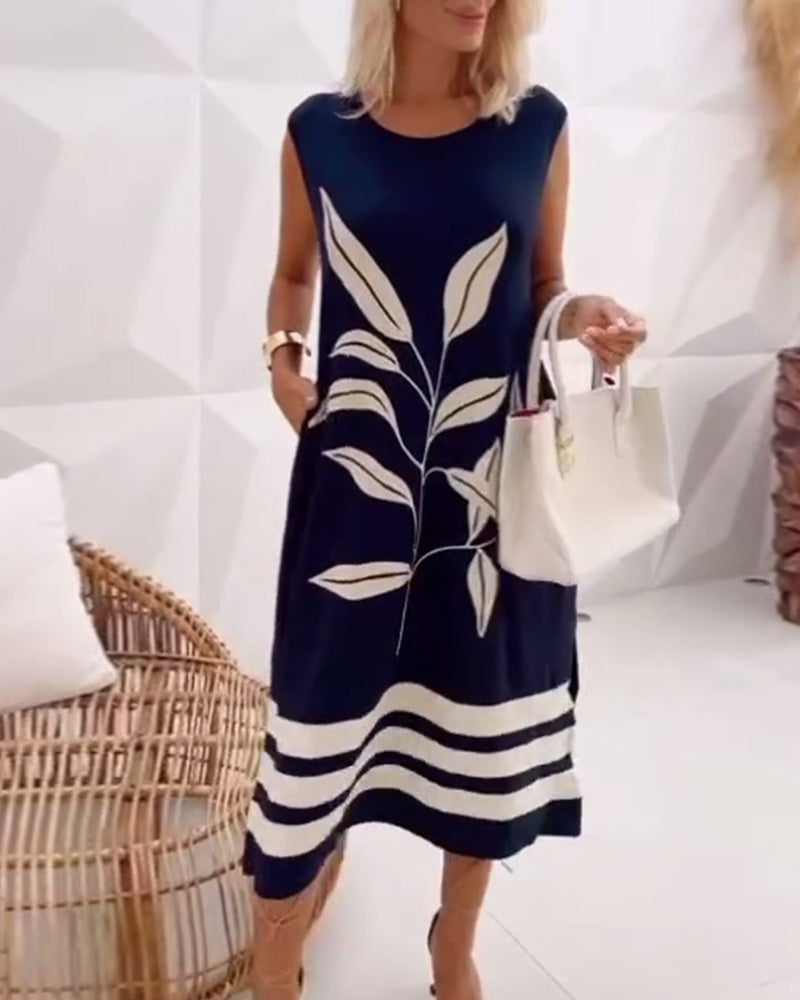 Elegantes ärmelloses Kleid mit Blattmuster