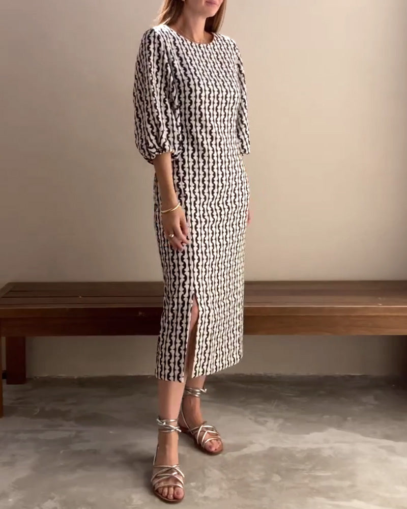 Abito con maniche a sbuffo e stampa geometrica