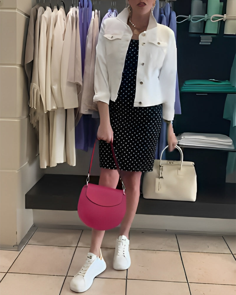 Abito a pois con ampio scollo a V