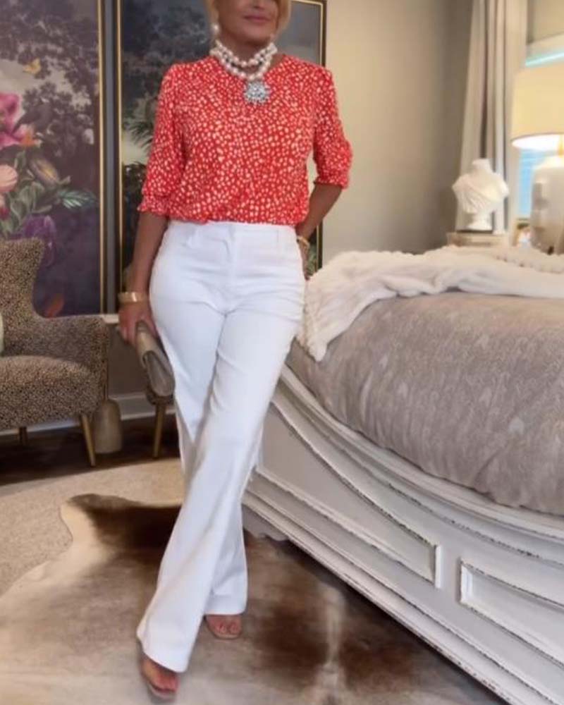 Camicetta a maniche corte con scollo tondo e stampa a pois