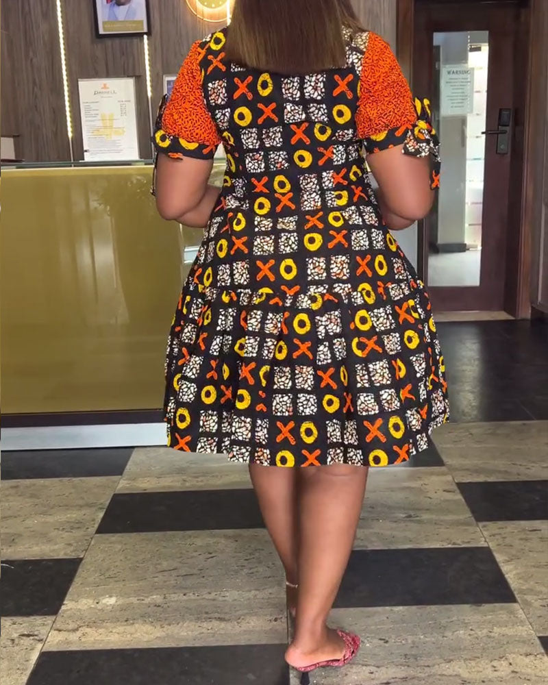 Abito con stampa a contrasto vintage e mezza zip