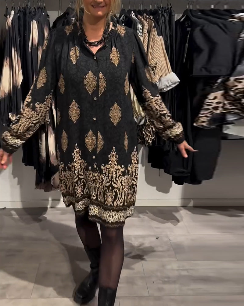 Abito con stampa vintage e bottoni a bavero