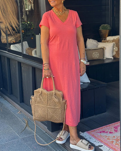 Abito lungo a maniche corte in tinta unita con scollo a V