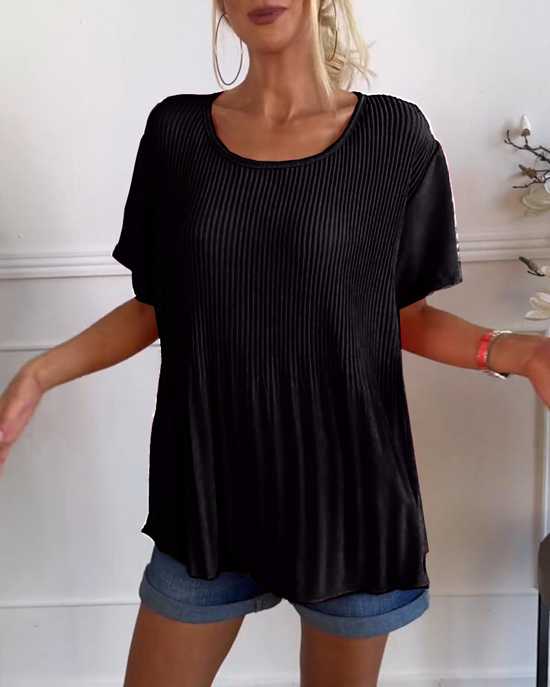 Blusa plissettata a tinta unita con scollo tondo