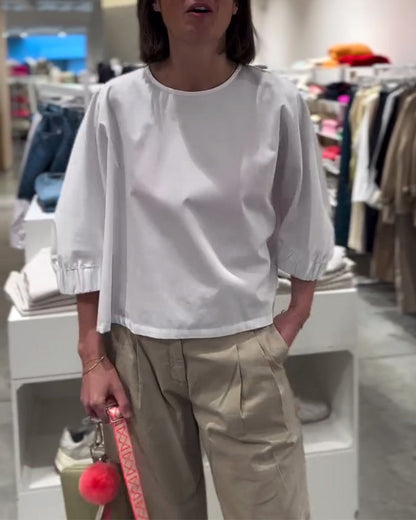 Camicetta ampia tinta unita con maniche a pipistrello