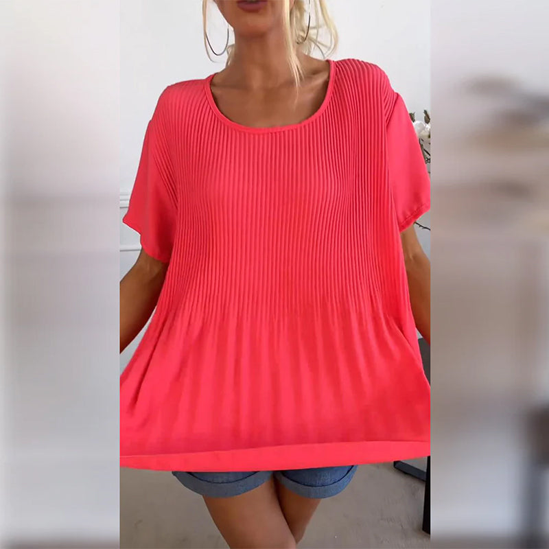 Blusa plissettata a tinta unita con scollo tondo