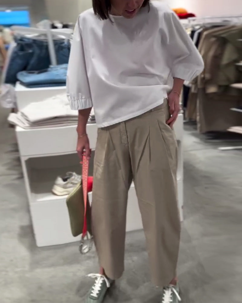 Camicetta ampia tinta unita con maniche a pipistrello