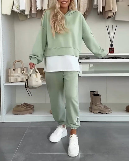 Lässiges Set aus Kapuzenpullover und Hose