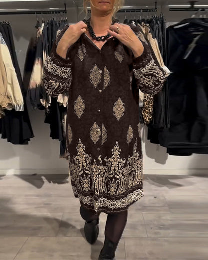 Abito con stampa vintage e bottoni a bavero