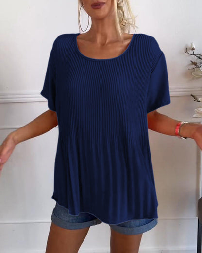 Blusa plissettata a tinta unita con scollo tondo