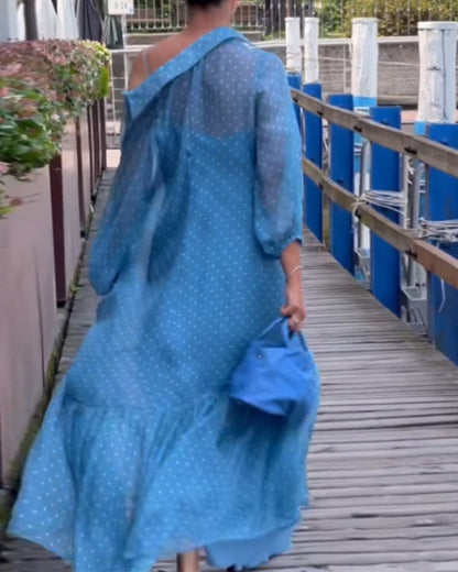 Abito e vestito con stampa a pois e risvolto