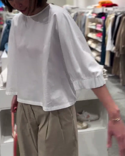 Camicetta ampia tinta unita con maniche a pipistrello