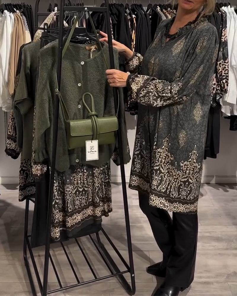 Abito con stampa vintage e bottoni a bavero