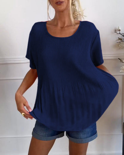 Blusa plissettata a tinta unita con scollo tondo
