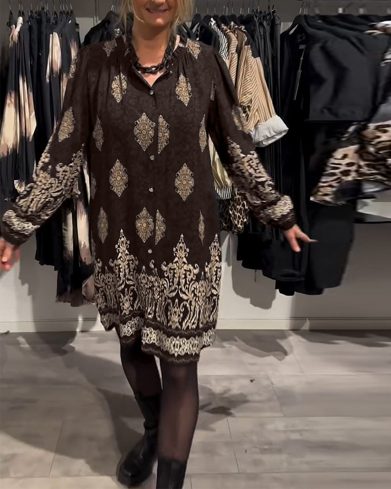 Abito con stampa vintage e bottoni a bavero