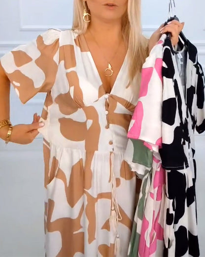 Abito da festa stampato con scollo a V profondo