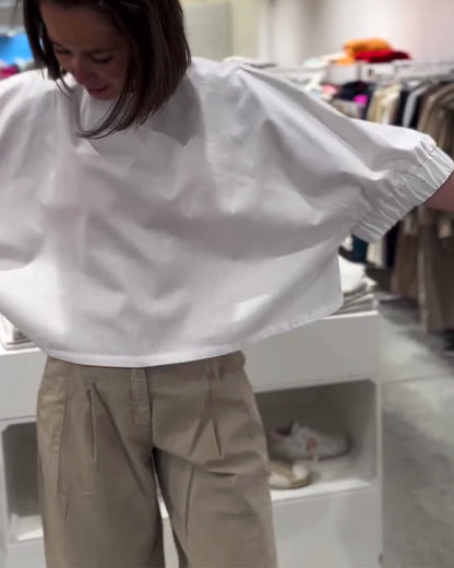 Camicetta ampia tinta unita con maniche a pipistrello