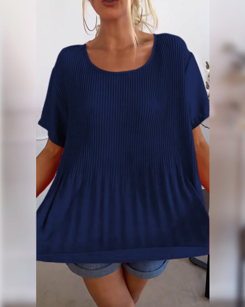 Blusa plissettata a tinta unita con scollo tondo