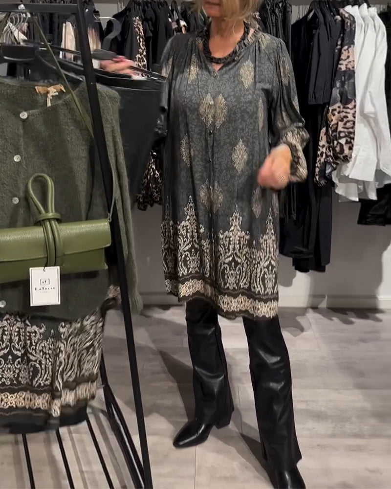 Abito con stampa vintage e bottoni a bavero