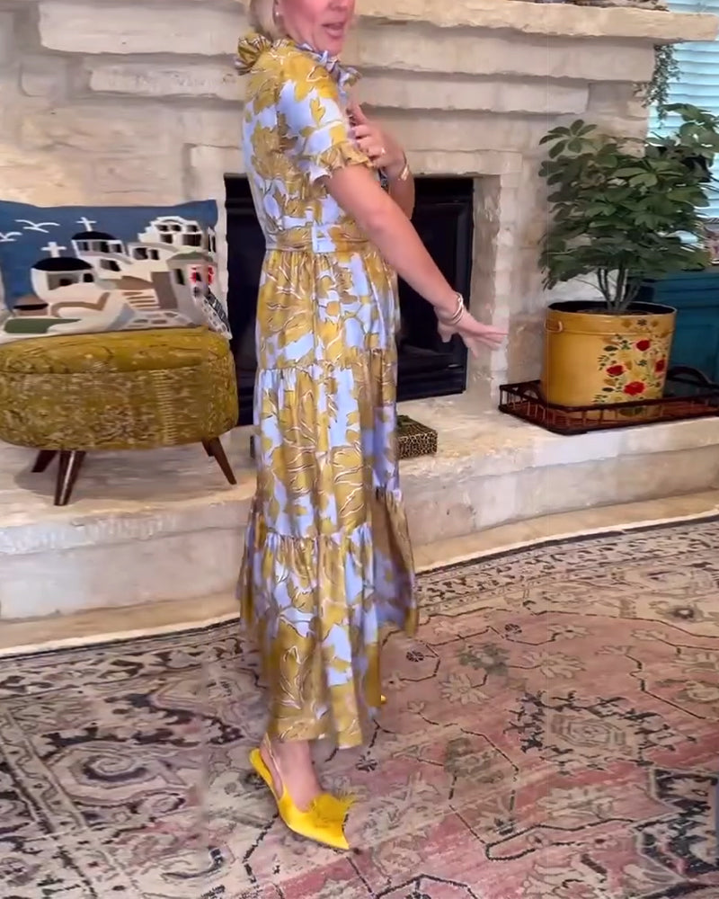 Abito lungo stampato a maniche corte con volant