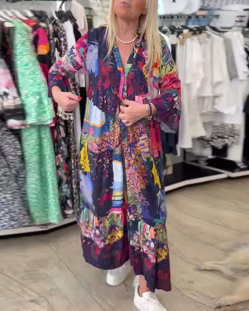 Abito a trapezio con stampa ampia e maniche a tromba