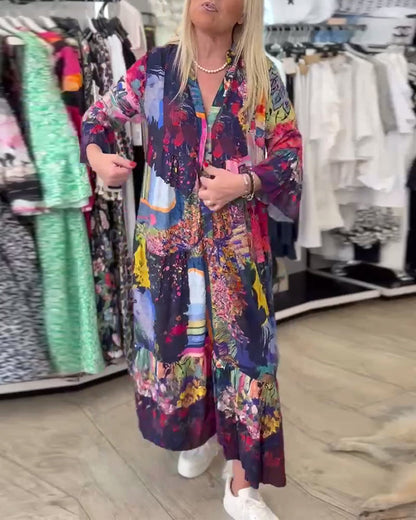 Abito a trapezio con stampa ampia e maniche a tromba