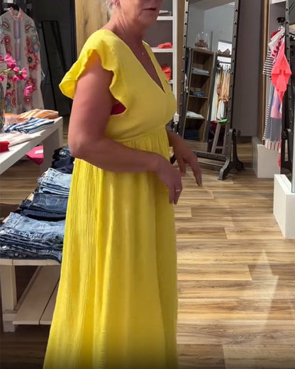 Abito a trapezio con scollo a V e maniche a balze