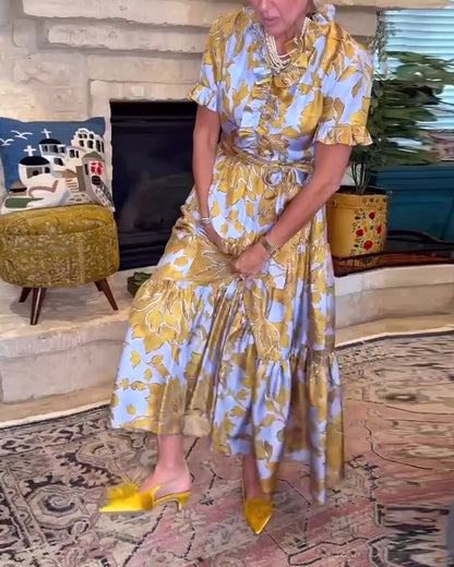 Abito lungo stampato a maniche corte con volant