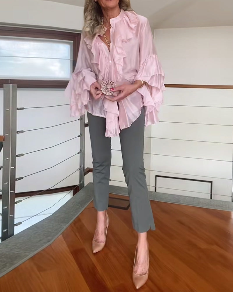 Camicetta alla moda con volant