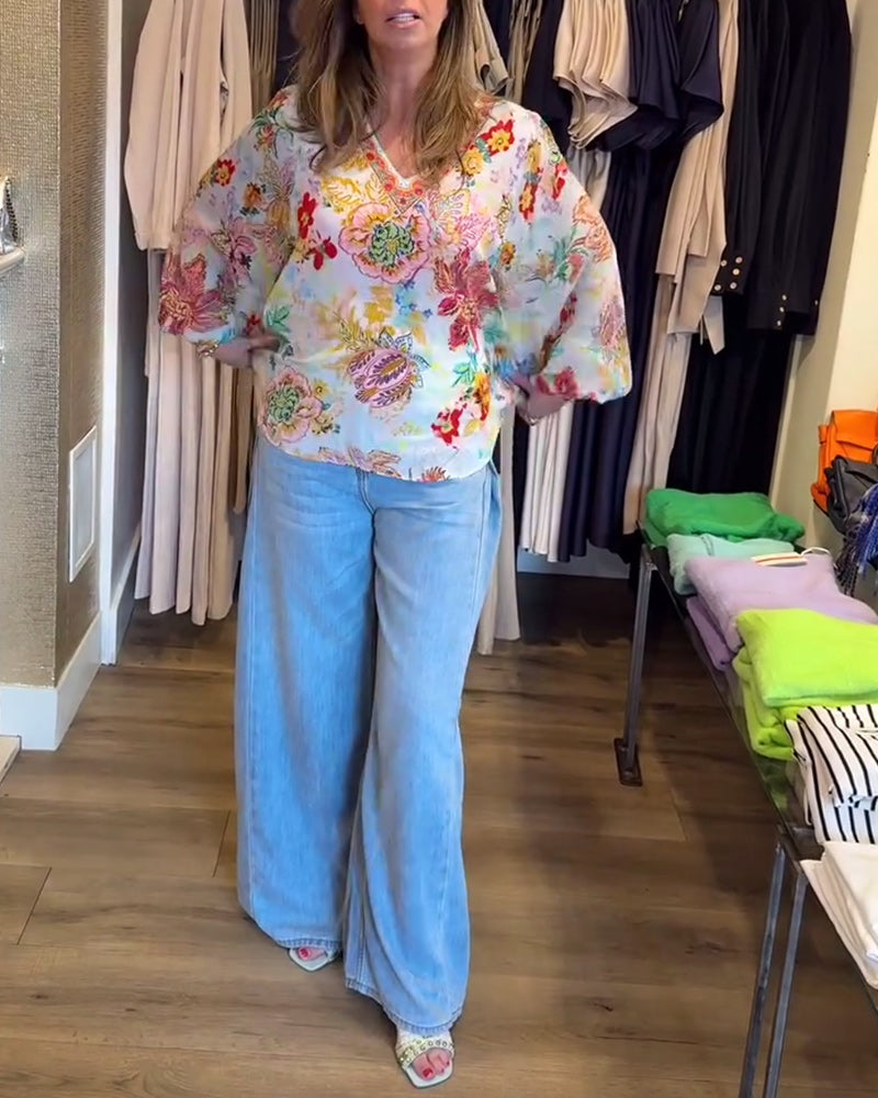 Bluse mit V-Ausschnitt und buntem Blumendruck