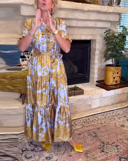 Abito lungo stampato a maniche corte con volant