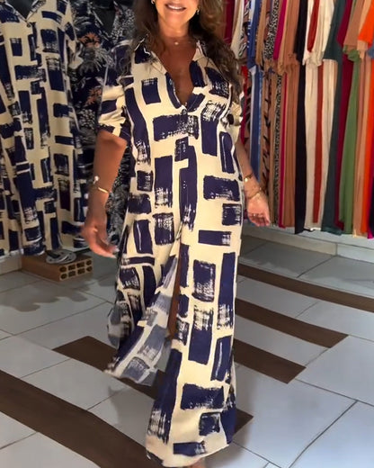 Abito a quadri con spacchi sul revers e blocchi di colore