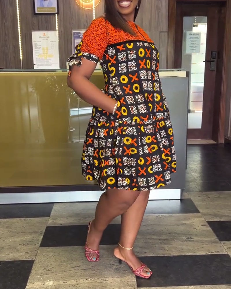 Abito con stampa a contrasto vintage e mezza zip