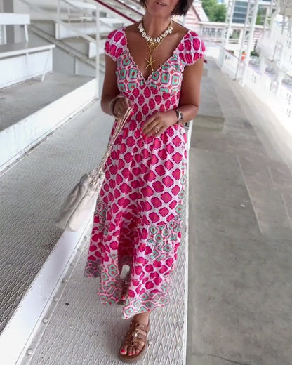 Abito lungo stampato con scollo a V profondo sexy