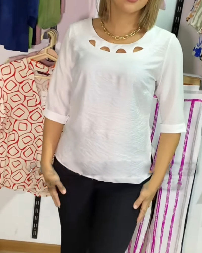 Blusa a tinta unita con scollo tondo e scollo a V