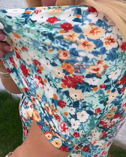 Camicetta plissettata con stampa floreale a maniche corte