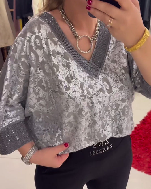 Blusa casual stampata con scollo a V