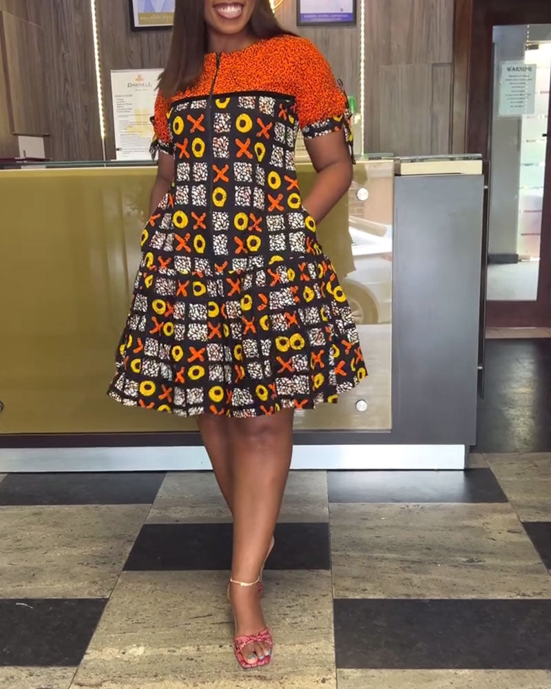 Abito con stampa a contrasto vintage e mezza zip