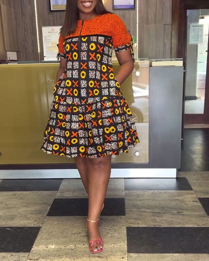 Abito con stampa a contrasto vintage e mezza zip