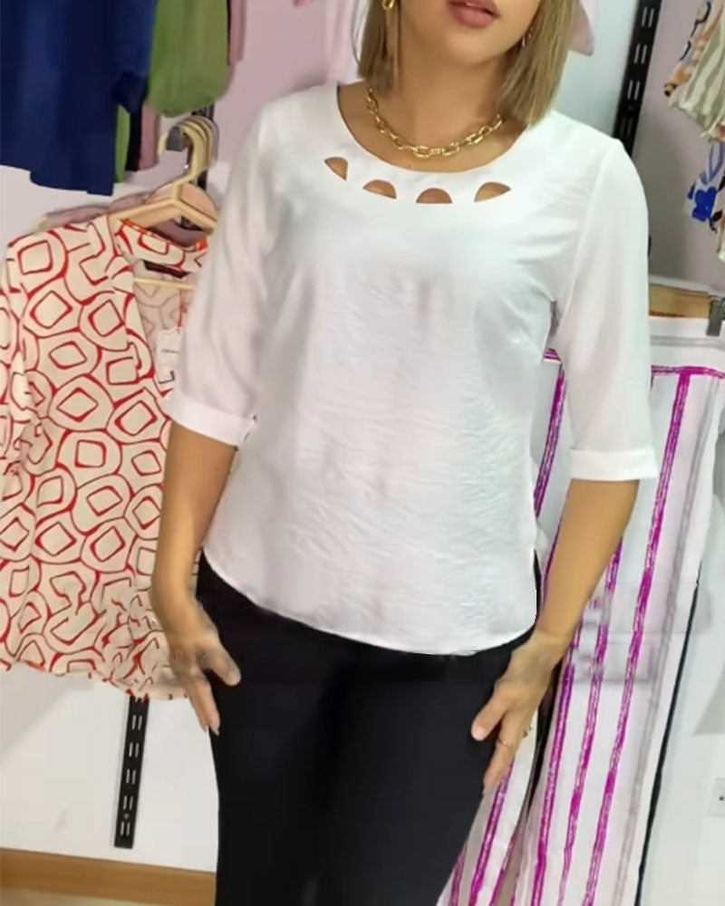 Blusa a tinta unita con scollo tondo e scollo a V