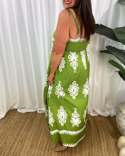 Abito con bretelle senza schienale