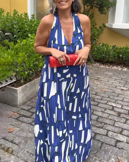 Abito elegante con stampa geometrica e scollo a V