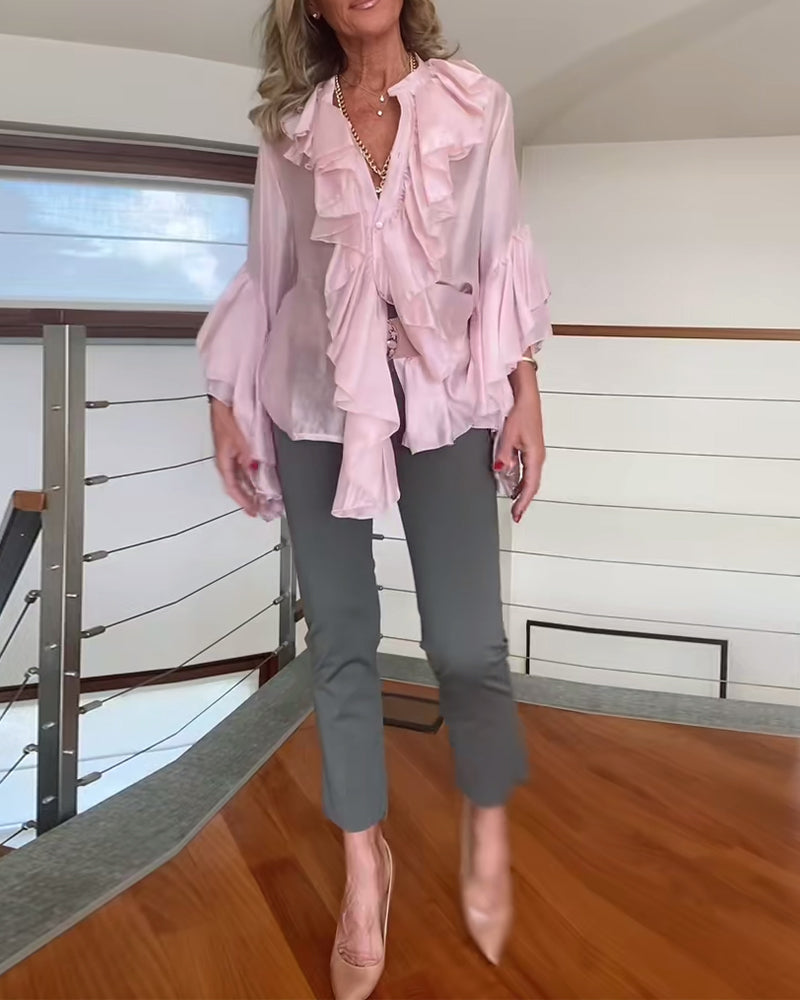 Camicetta alla moda con volant