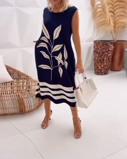 Elegantes ärmelloses Kleid mit Blattmuster