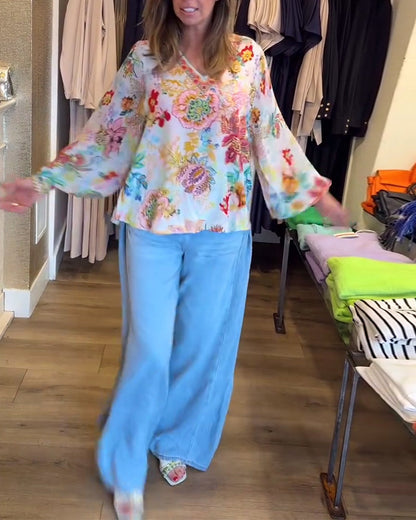 Bluse mit V-Ausschnitt und buntem Blumendruck