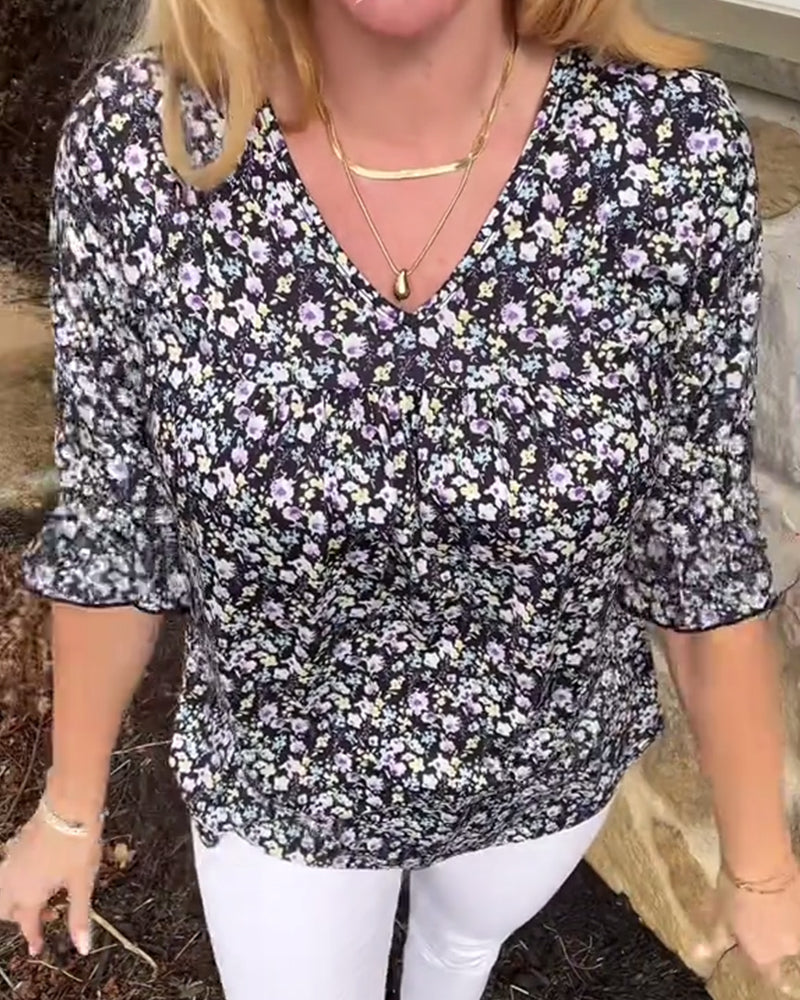 Halbärmelige Bluse mit V-Ausschnitt und Blumenmuster