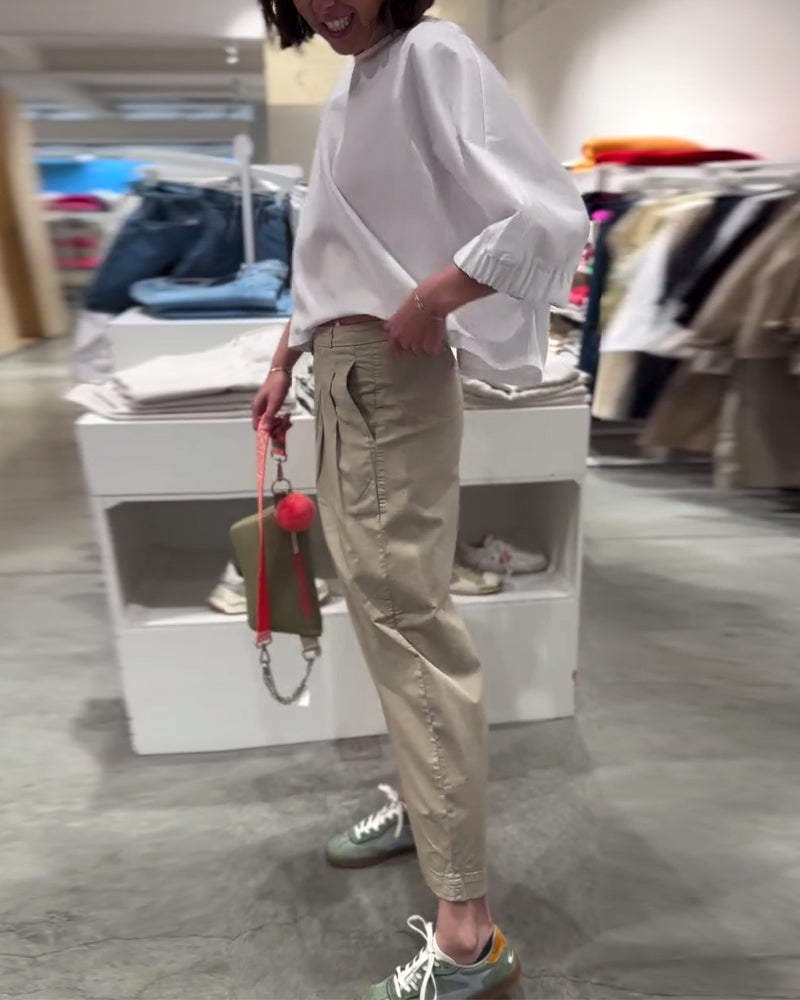 Camicetta ampia tinta unita con maniche a pipistrello